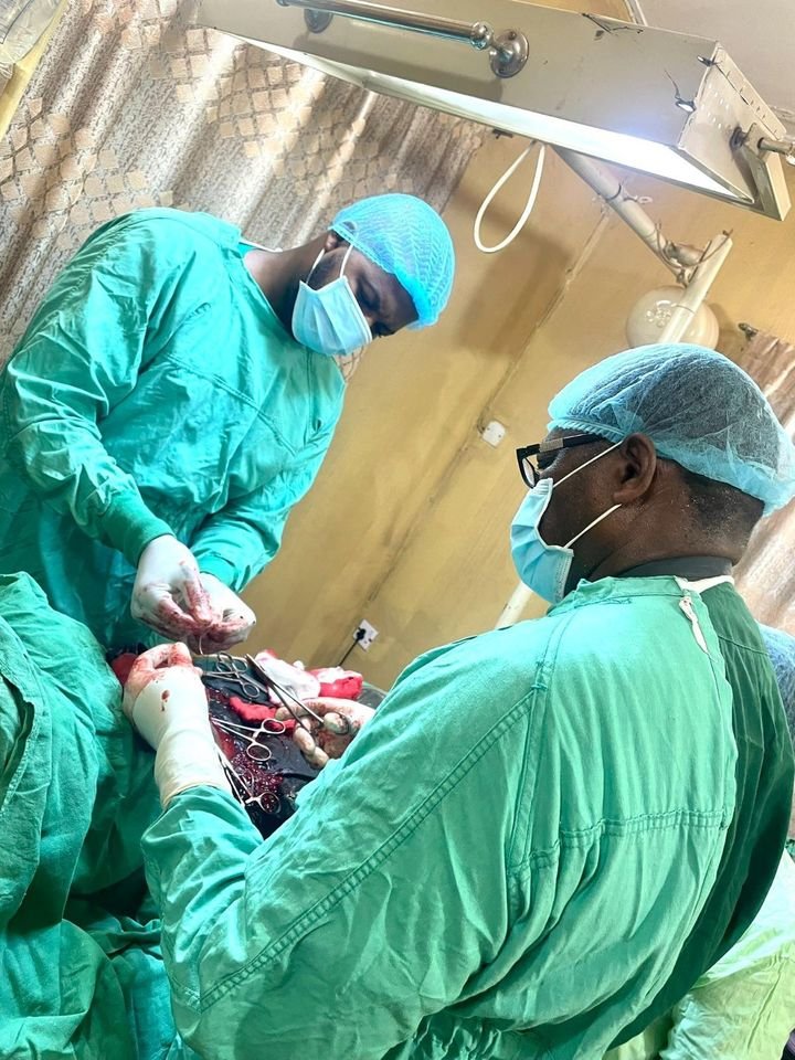 PHOTOS: Father-Son Doctors Perform Surgery Together