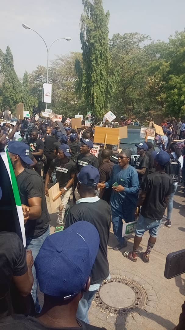 PHOTO: Atiku, PDP supporters storm INEC headquarters in protest